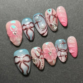Bow & Floral NailsCarefully designed pure handmade press-on gel nails
