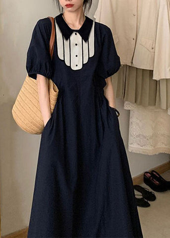 Moderne schwarze Peter Pan Kragen Taschen schmeicheln Maxi Kleider Kurzarm