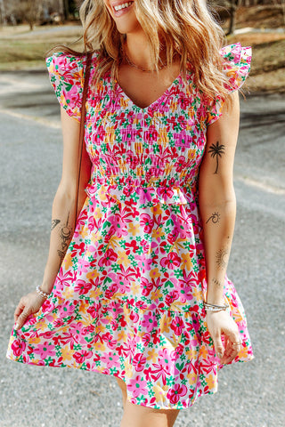 Gesmoktes Kleid mit floralem Rüschenbesatz