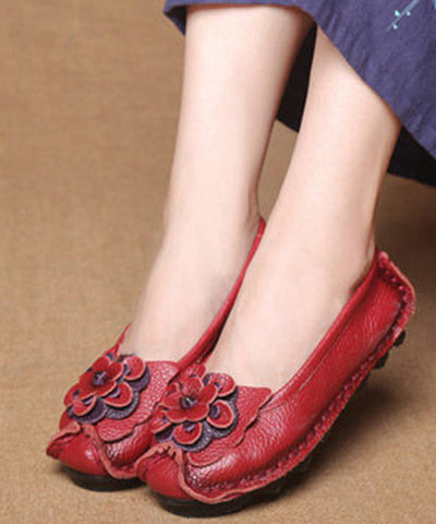 Boutique Gelbe flache Schuhe aus Rindsleder mit Blumenmuster