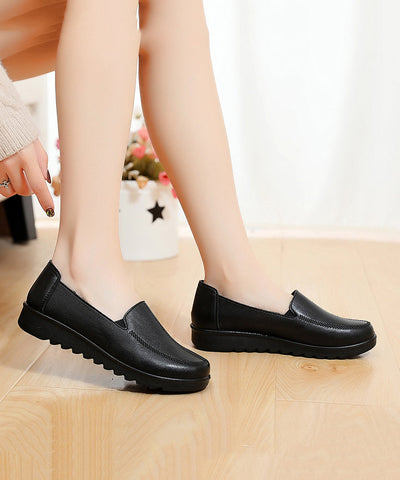 Boutique Schwarze flache Schuhe aus Rindsleder
