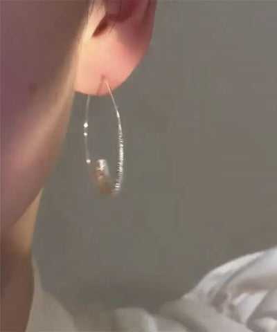 Oversize Silk Stergild Silver Hoop Earrings