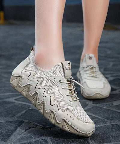 Beige, atmungsaktive Mesh-Schuhe mit Kreuzriemen und Spleißen von Plattfüßen