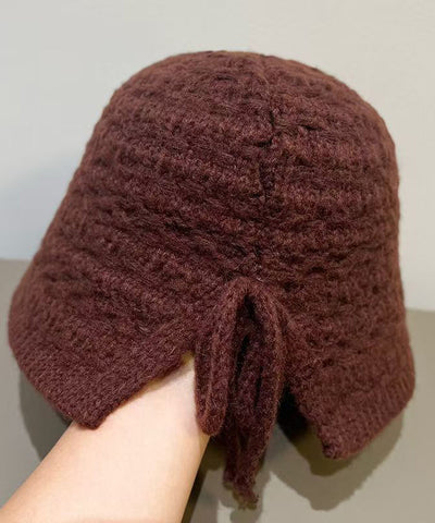 Gelbe Retro-Strickmütze mit Schnürung