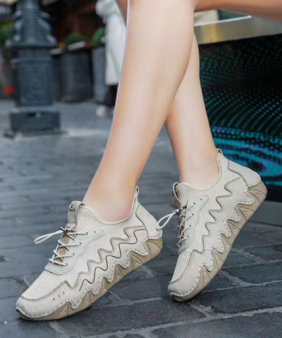 Beige, atmungsaktive Mesh-Schuhe mit Kreuzriemen und Spleißen von Plattfüßen