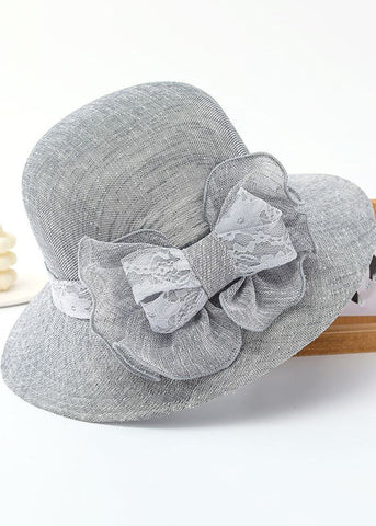 Schöner beigefarbener Schlapphut aus Leinen mit Patchwork-Spitze und Schleife