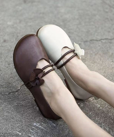 Braune flache Schuhe, edel, weich, mit Blumenmuster