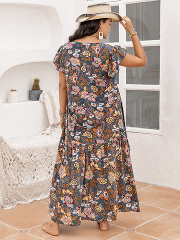Große Größen - Maxikleid mit Rüschen und bedruckten Flügelärmeln
