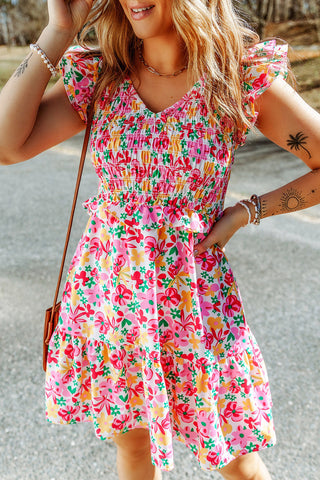 Gesmoktes Kleid mit floralem Rüschenbesatz
