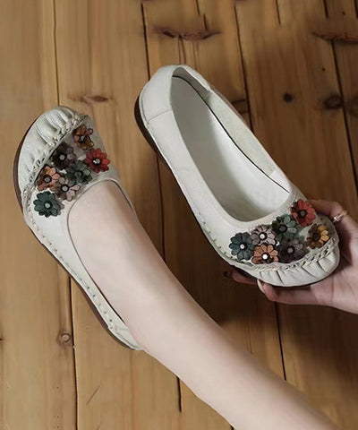 Einzigartige schwarze flache Schuhe mit Blumenmuster