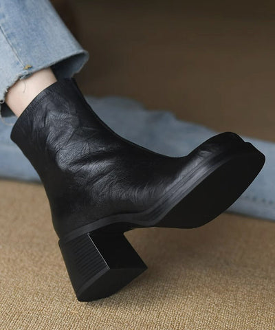 Modische Stiefel mit Reißverschluss und klobigem Absatz in Schwarz aus Kunstleder