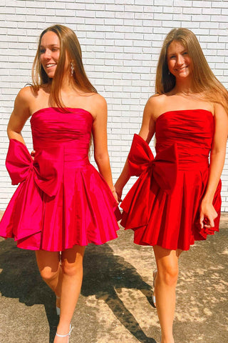 A-Linien-Partykleid ohne Träger und mit Plissee und Schleife