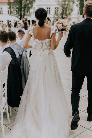 Tulle Off the shoulder A-line Sweep Train Wedding Dresses With Appliques