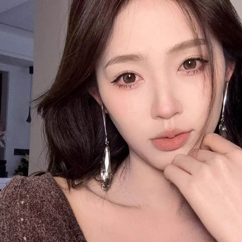 Retro exaggerated big water drop fringed earrings women's light luxury high-end sense unique stud earrings design sense atmospheric earrings