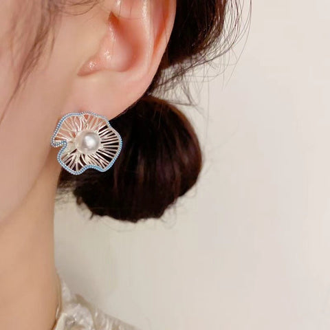 Cold feeling hollow bead flower ball stud earrings women's new earrings high-end sense niche design temperament earrings