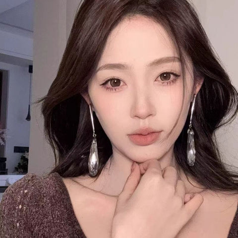 Retro exaggerated big water drop fringed earrings women's light luxury high-end sense unique stud earrings design sense atmospheric earrings