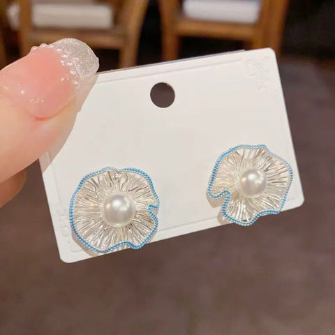 Cold feeling hollow bead flower ball stud earrings women's new earrings high-end sense niche design temperament earrings