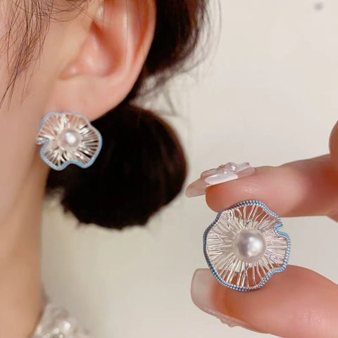 Cold feeling hollow bead flower ball stud earrings women's new earrings high-end sense niche design temperament earrings