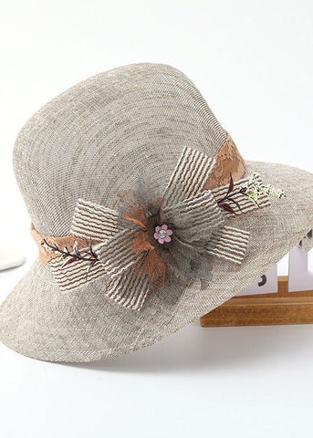 Schöner beigefarbener Schlapphut aus Leinen mit Patchwork-Spitze und Schleife