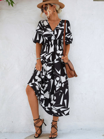Bedrucktes Kleid mit Überwurf und Ballonärmeln