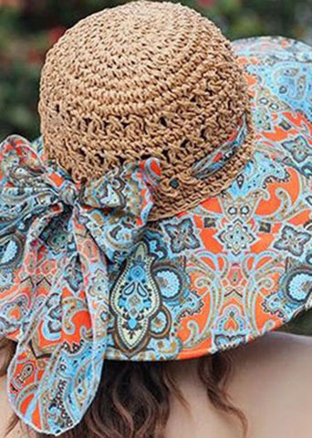 Edler Khakifarbener Schlapphut aus gewebtem Stroh mit Patchwork-Muster und Schleife