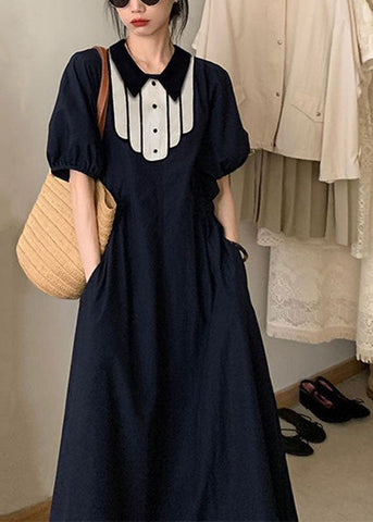 Moderne schwarze Peter Pan Kragen Taschen schmeicheln Maxi Kleider Kurzarm
