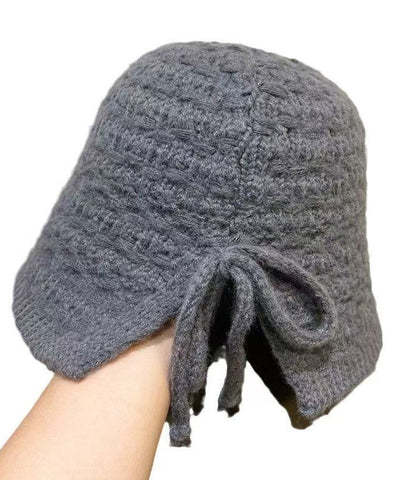 Gelbe Retro-Strickmütze mit Schnürung