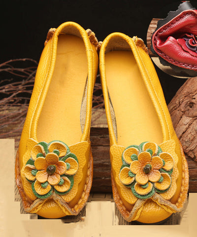 Boutique Gelbe flache Schuhe aus Rindsleder mit Blumenmuster