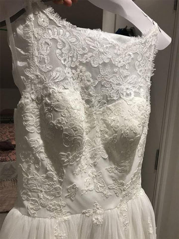Glamouröse ärmellose, kurze A-Linien-Brautkleider aus Spitze