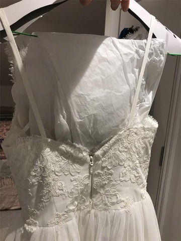Glamouröse ärmellose, kurze A-Linien-Brautkleider aus Spitze