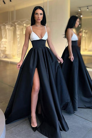 Wunderschönes schwarz-weißes Ballkleid mit langen, geschlitzten Spaghettiträgern